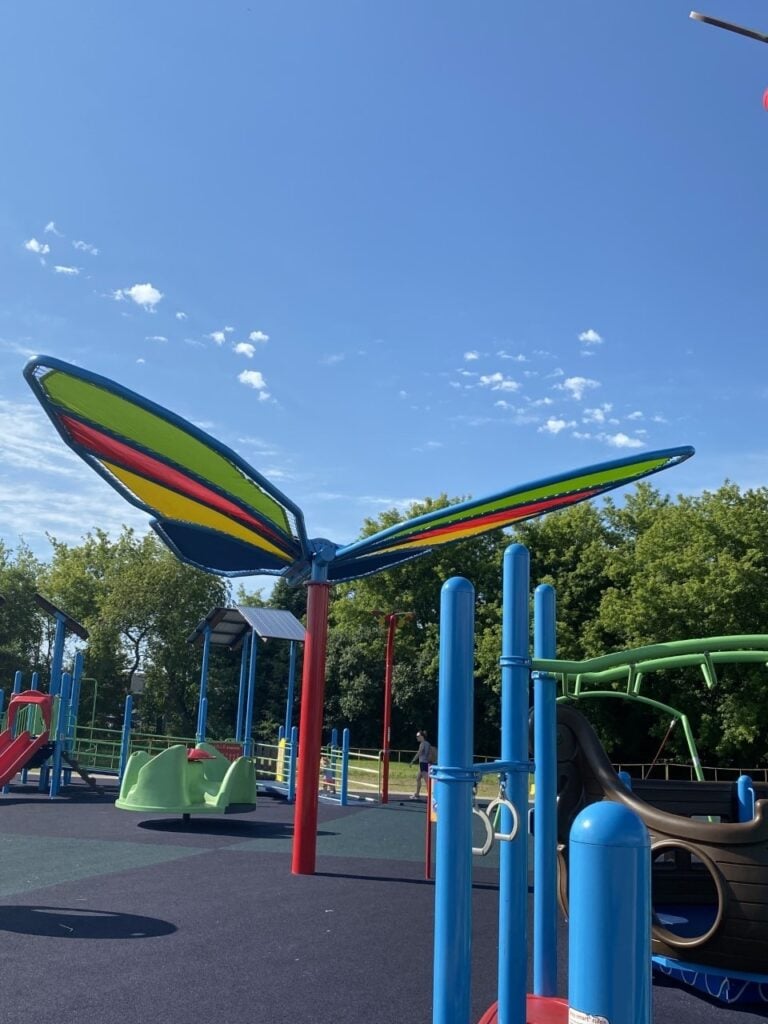 rainbow butterfly shade structure at All My Friends playground in Grafton Wisconsin