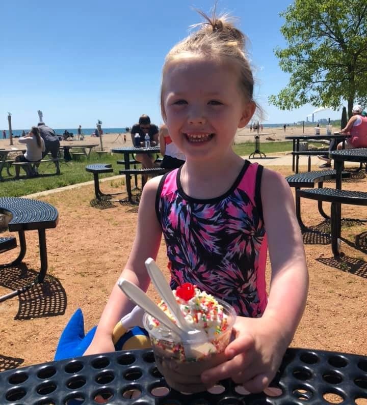 girl eating frozen custard at Ferch's Beachside Grille Bay View Wisconsin